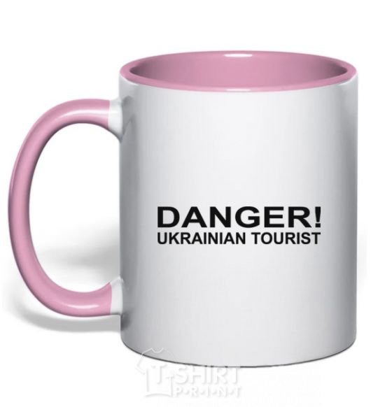 Mug with a colored handle DANGER! UKRAINIAN TOURIST light-pink фото