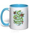 Mug with a colored handle A rattlesnake with leaves sky-blue фото