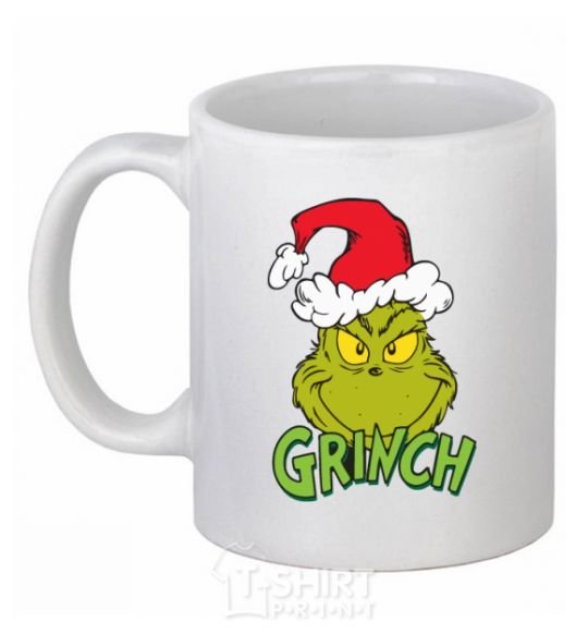 Ceramic mug A Grinch in a Santa Claus hat White фото