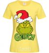 Women's T-shirt A Grinch in a Santa Claus hat cornsilk фото