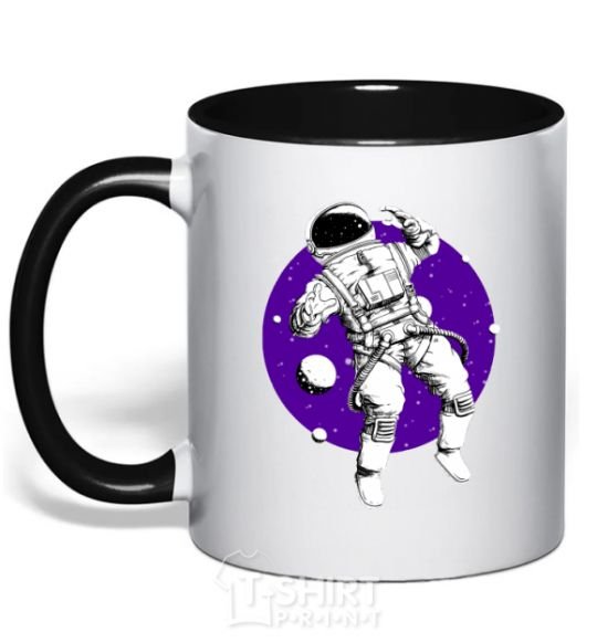Mug with a colored handle An astronaut in round space black фото