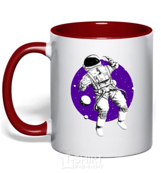 Mug with a colored handle An astronaut in round space red фото