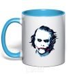 Mug with a colored handle The joker is drawn sky-blue фото