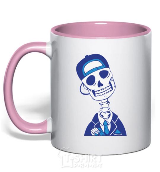 Mug with a colored handle A skull in a cap light-pink фото
