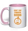 Mug with a colored handle dont eat pumpkin seeds light-pink фото