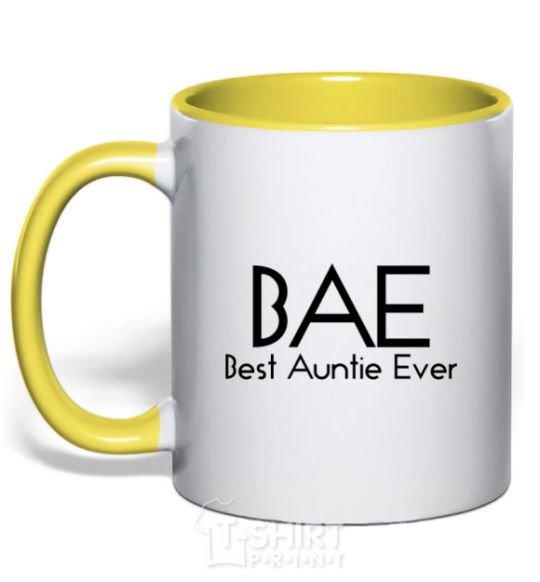 Mug with a colored handle Best auntie ever yellow фото