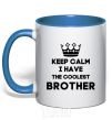 Mug with a colored handle Keep calm i have the coolest brother royal-blue фото