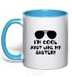 Mug with a colored handle I am cool just like my sister sky-blue фото