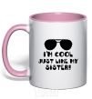 Mug with a colored handle I am cool just like my sister light-pink фото