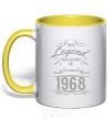 Mug with a colored handle This legend was born in december yellow фото