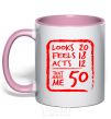Mug with a colored handle That makes me 50 light-pink фото