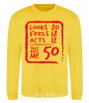 Sweatshirt That makes me 50 yellow фото