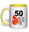 Mug with a colored handle 50 and still hot like fire yellow фото