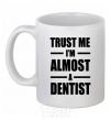 Ceramic mug Trust me i'm almost dentist White фото