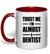Mug with a colored handle Trust me i'm almost dentist red фото
