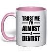 Mug with a colored handle Trust me i'm almost dentist light-pink фото