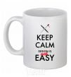 Ceramic mug Keep calm design is not easy White фото