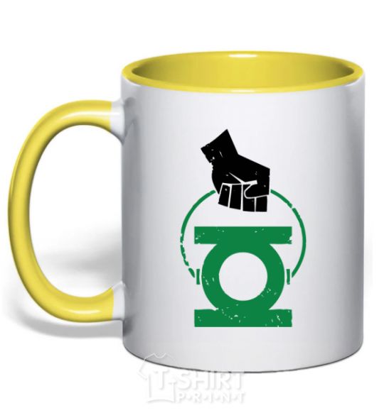 Mug with a colored handle A hand holding a green lantern yellow фото