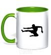 Mug with a colored handle A fighter in a jump kelly-green фото