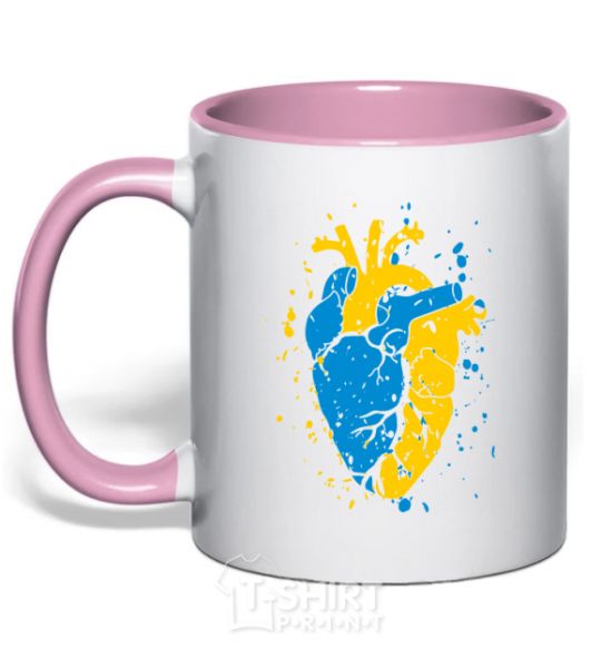 Mug with a colored handle The heart of a Ukrainian light-pink фото