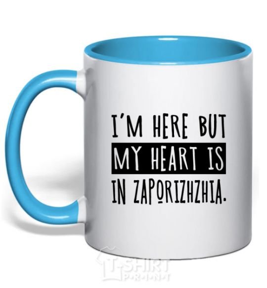 Mug with a colored handle I'm here but my heart is in Zaporizhzhia sky-blue фото