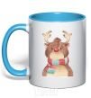 Mug with a colored handle A reindeer in a scarf sky-blue фото