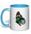 Mug with a colored handle Green butterfly with orange dots sky-blue фото