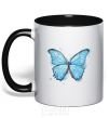 Mug with a colored handle A soft blue butterfly black фото