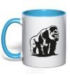 Mug with a colored handle The gorilla is sitting sky-blue фото