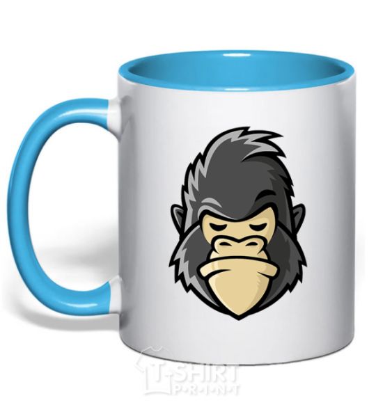 Mug with a colored handle A disgruntled gorilla sky-blue фото