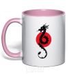 Mug with a colored handle A dragon in a red circle light-pink фото