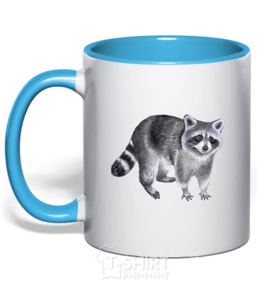 Mug with a colored handle A drawing of a raccoon sky-blue фото