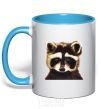 Mug with a colored handle Brown raccoon sky-blue фото