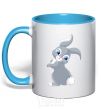 Mug with a colored handle A rabbit with a tail sky-blue фото