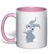 Mug with a colored handle A rabbit with a tail light-pink фото
