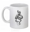 Ceramic mug A woman's hand with a snake White фото